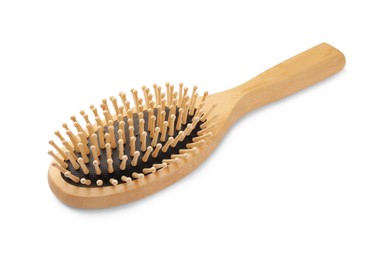 Photo of New wooden hair brush isolated on white