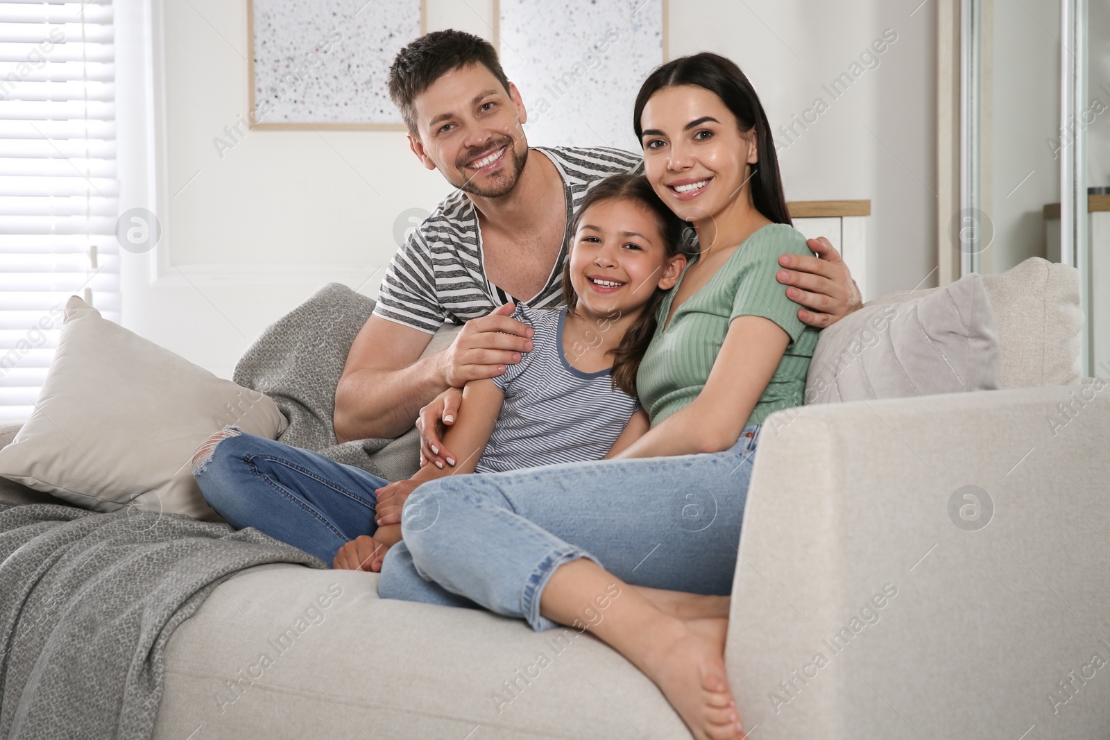 Photo of Happy family spending time together at home. Adoption concept