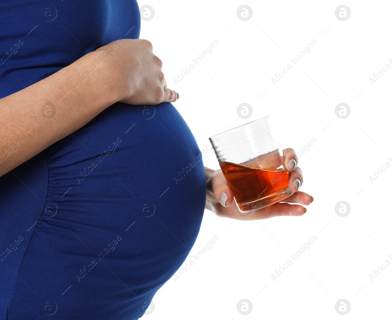 Photo of Future mother with glass of alcohol drink on white background, closeup. Bad habits during pregnancy