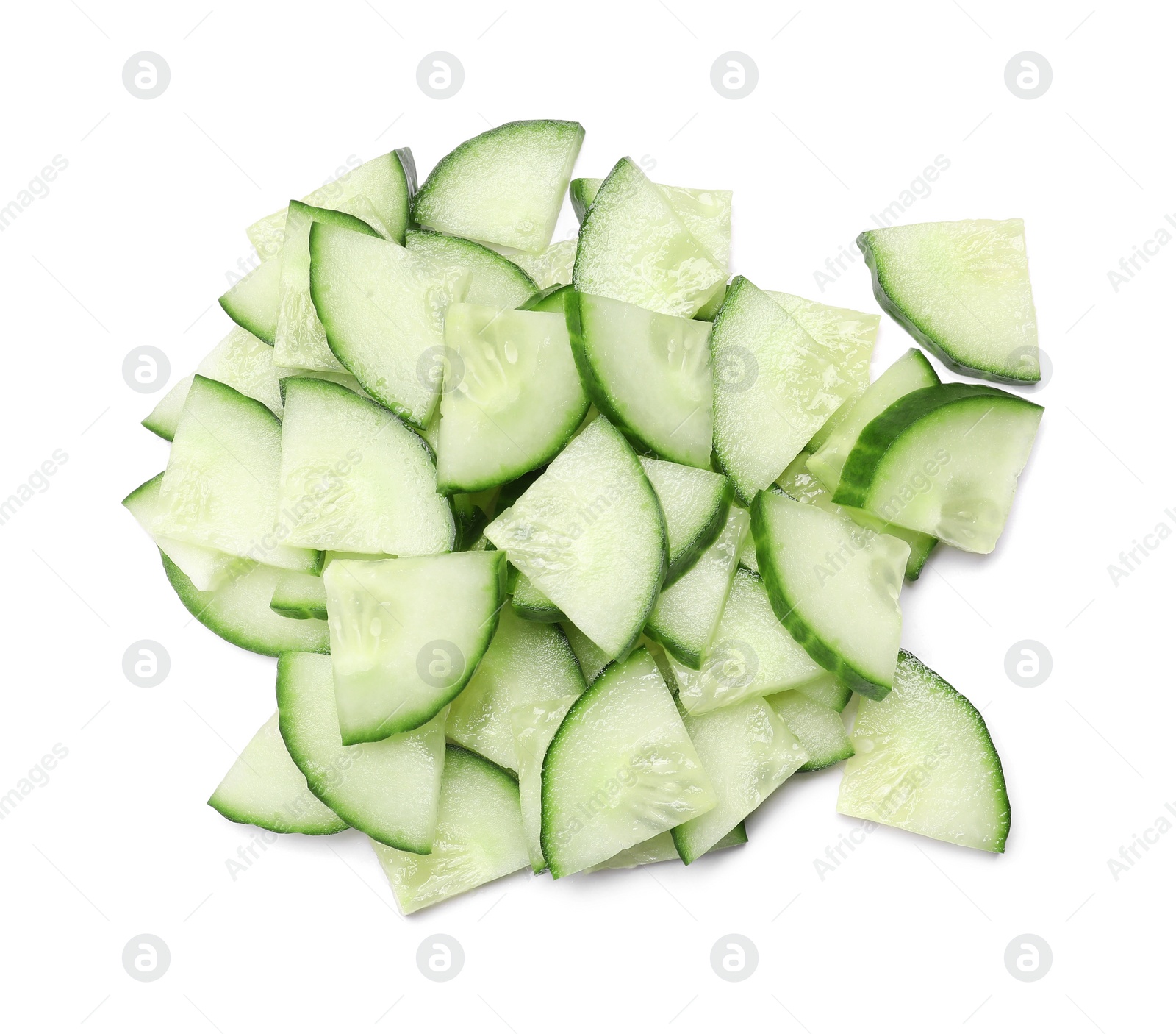 Photo of Pile of fresh cut cucumber isolated on white, top view