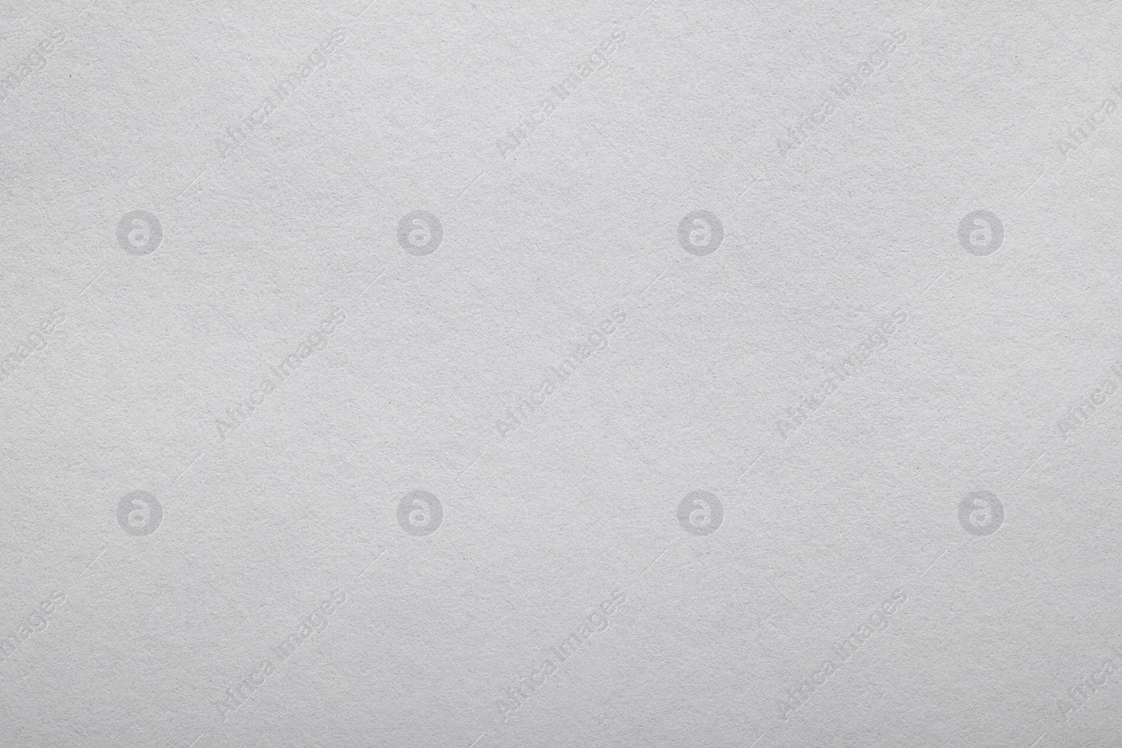 Photo of Texture of white paper sheet as background, top view