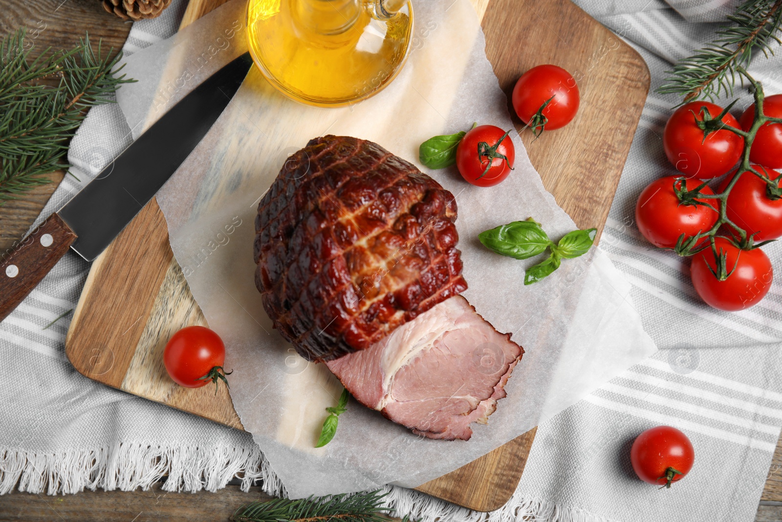 Photo of Festive flat lay composition with delicious ham on wooden table. Christmas dinner
