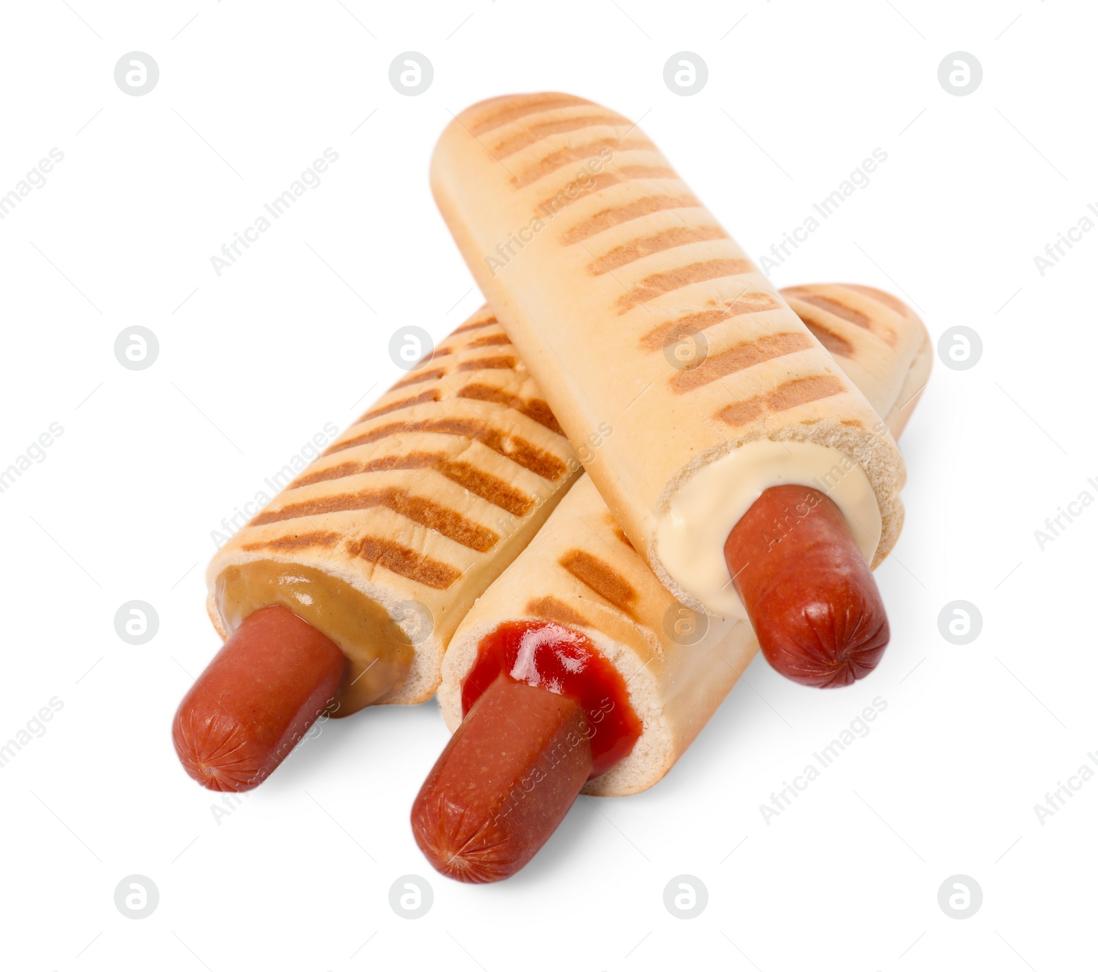 Photo of Tasty french hot dogs with different sauces on white background