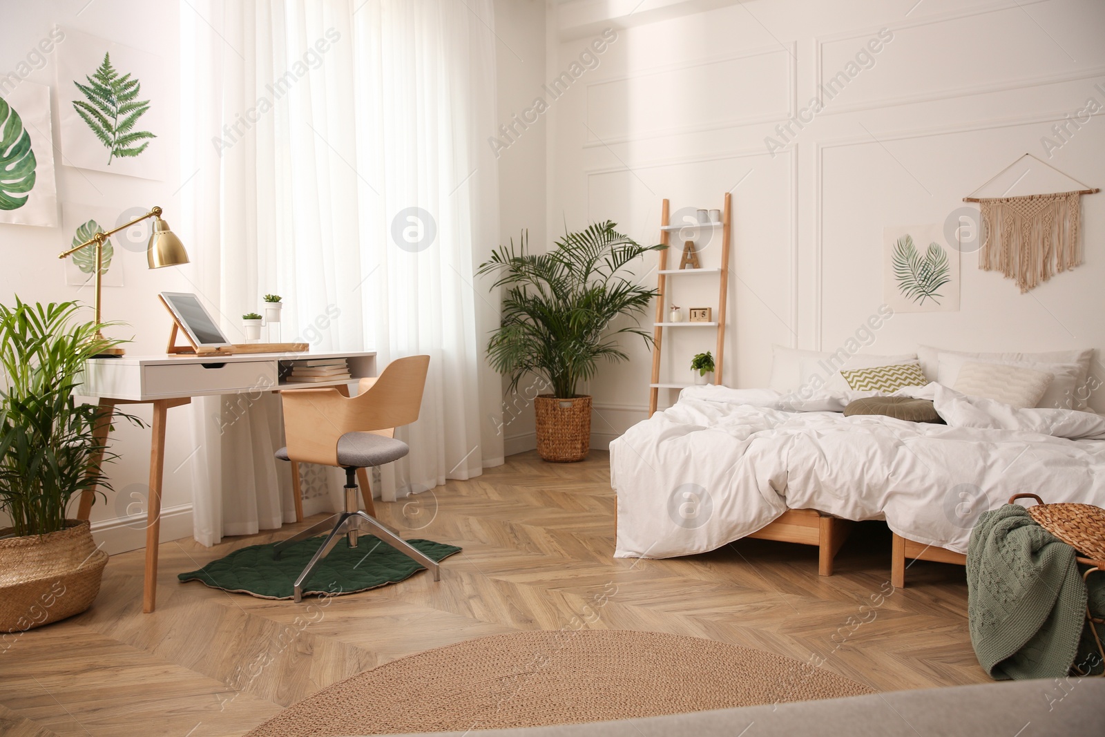 Photo of Modern bedroom with beautiful fresh house plants