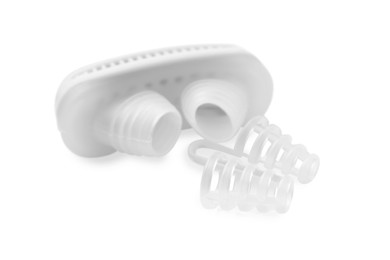 Different anti-snoring devices for nose on white background