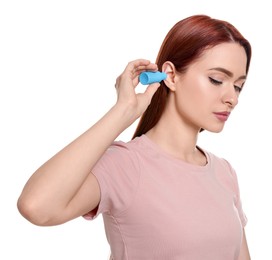 Photo of Woman using ear drops on white background