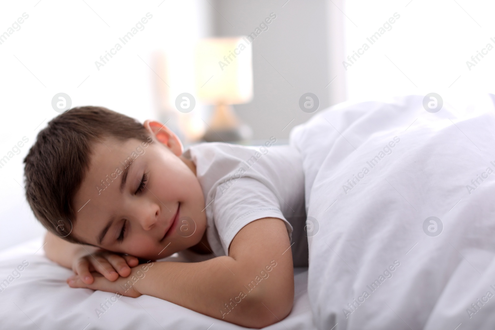 Photo of Cute little boy sleeping at home. Bedtime