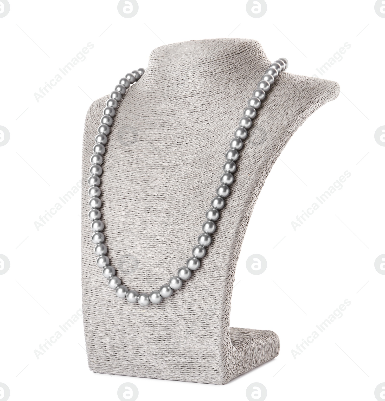 Photo of Stylish pearl necklace on jewelry bust against white background