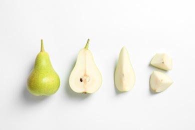 Ripe juicy pears on white background, top view