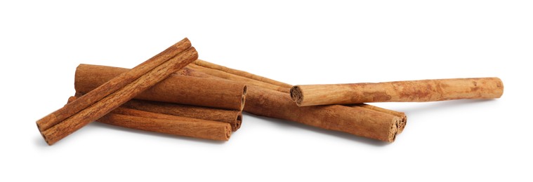 Dry aromatic cinnamon sticks isolated on white