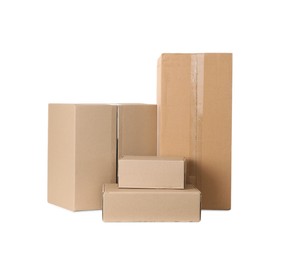 Photo of Pile of cardboard boxes on white background