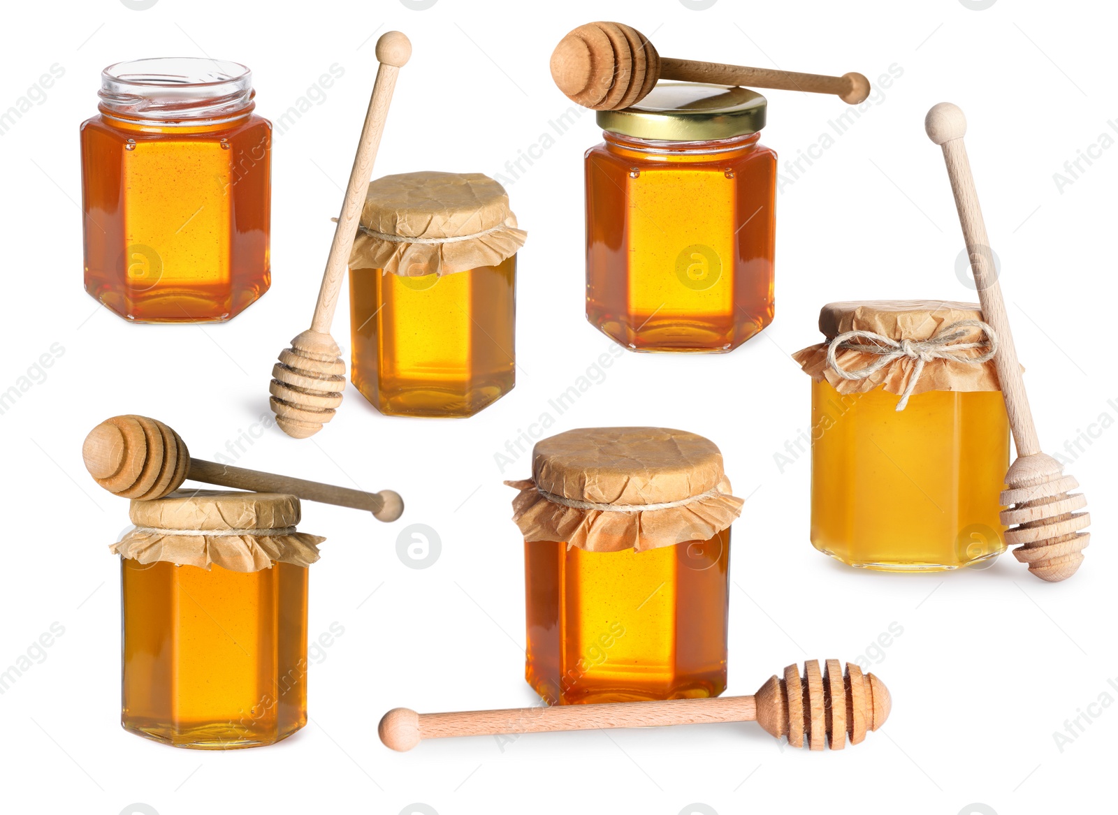 Image of Natural honey in glass jars and dippers isolated on white, set