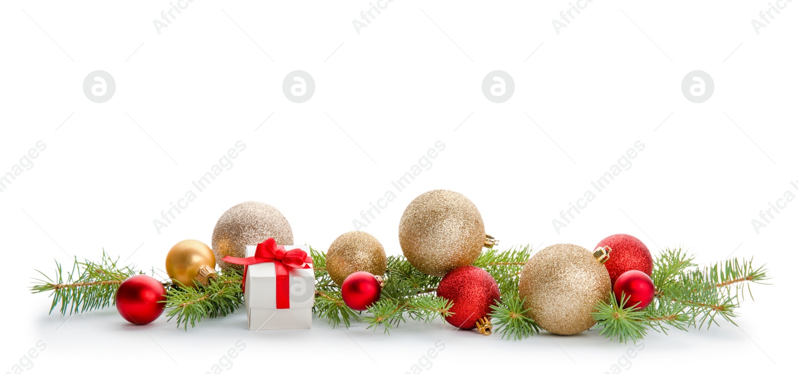 Photo of Composition with Christmas tree branches, festive decor and gift box on white background