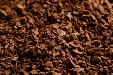 Dry instant coffee as background, closeup view