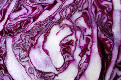 Photo of Fresh ripe red cabbage as background, closeup