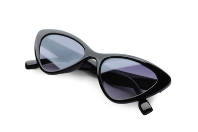 Photo of Stylish sunglasses on white background. Beach object