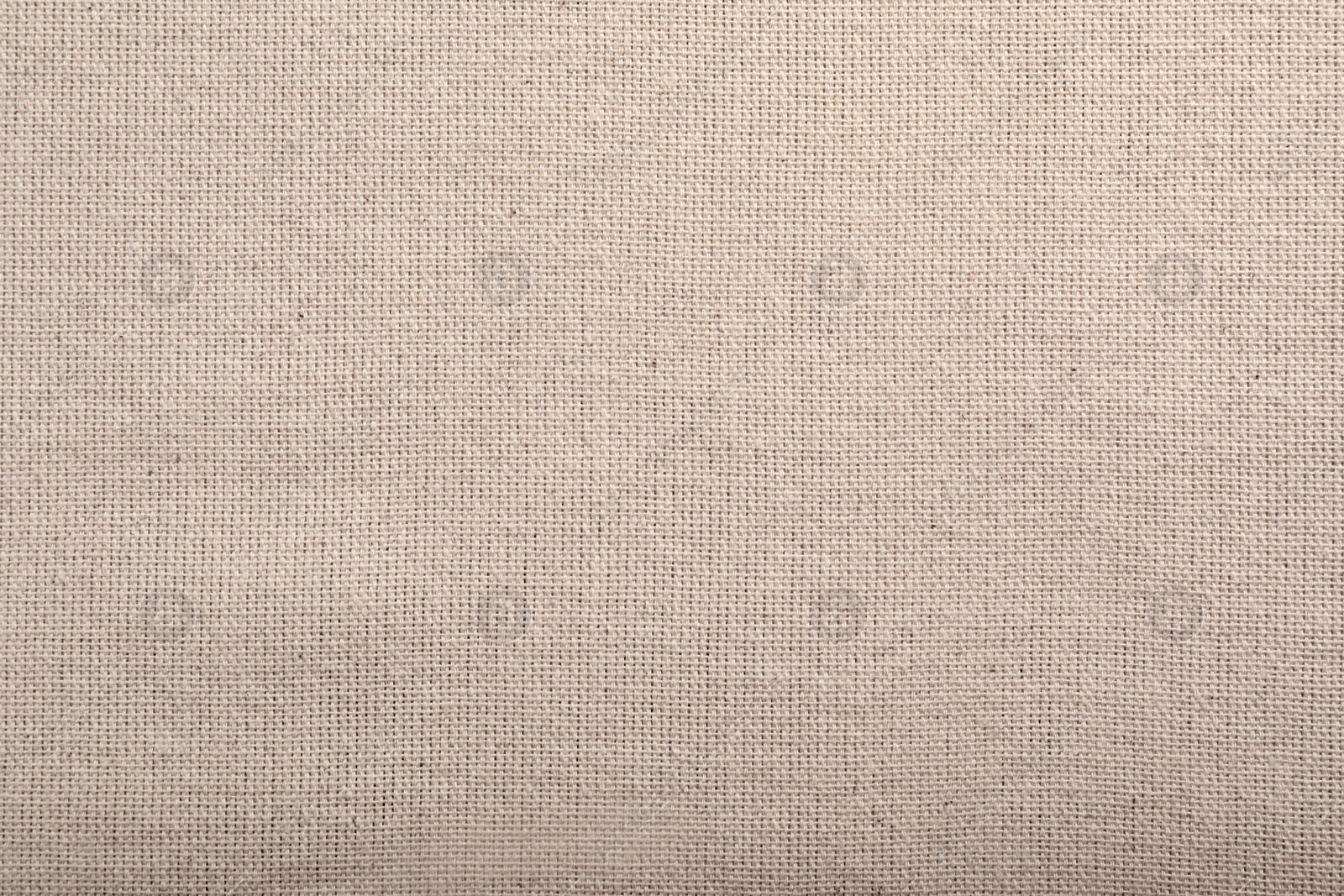 Photo of Beige hemp cloth as background, top view. Natural fabric