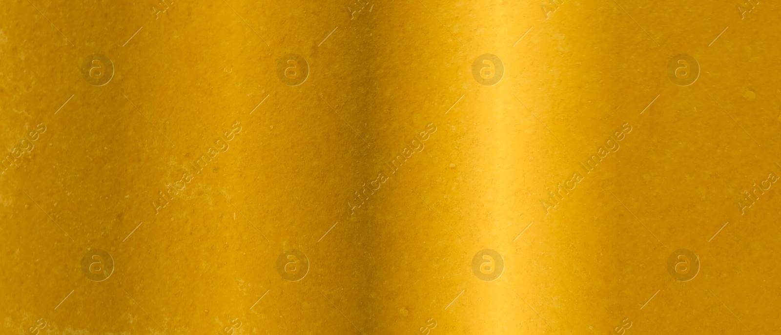 Image of Shiny gold surface as background, closeup view