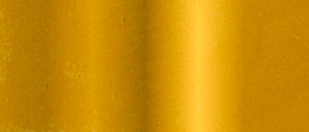 Image of Shiny gold surface as background, closeup view