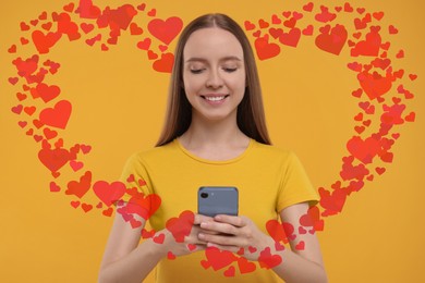 Long distance love. Woman chatting with sweetheart via smartphone on golden background. Hearts flying out of device and swirling around her