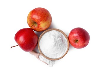 Photo of Bowl, scoop with sweet fructose powder and ripe apples on white background, top view