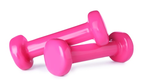 Color dumbbells on white background. Home fitness