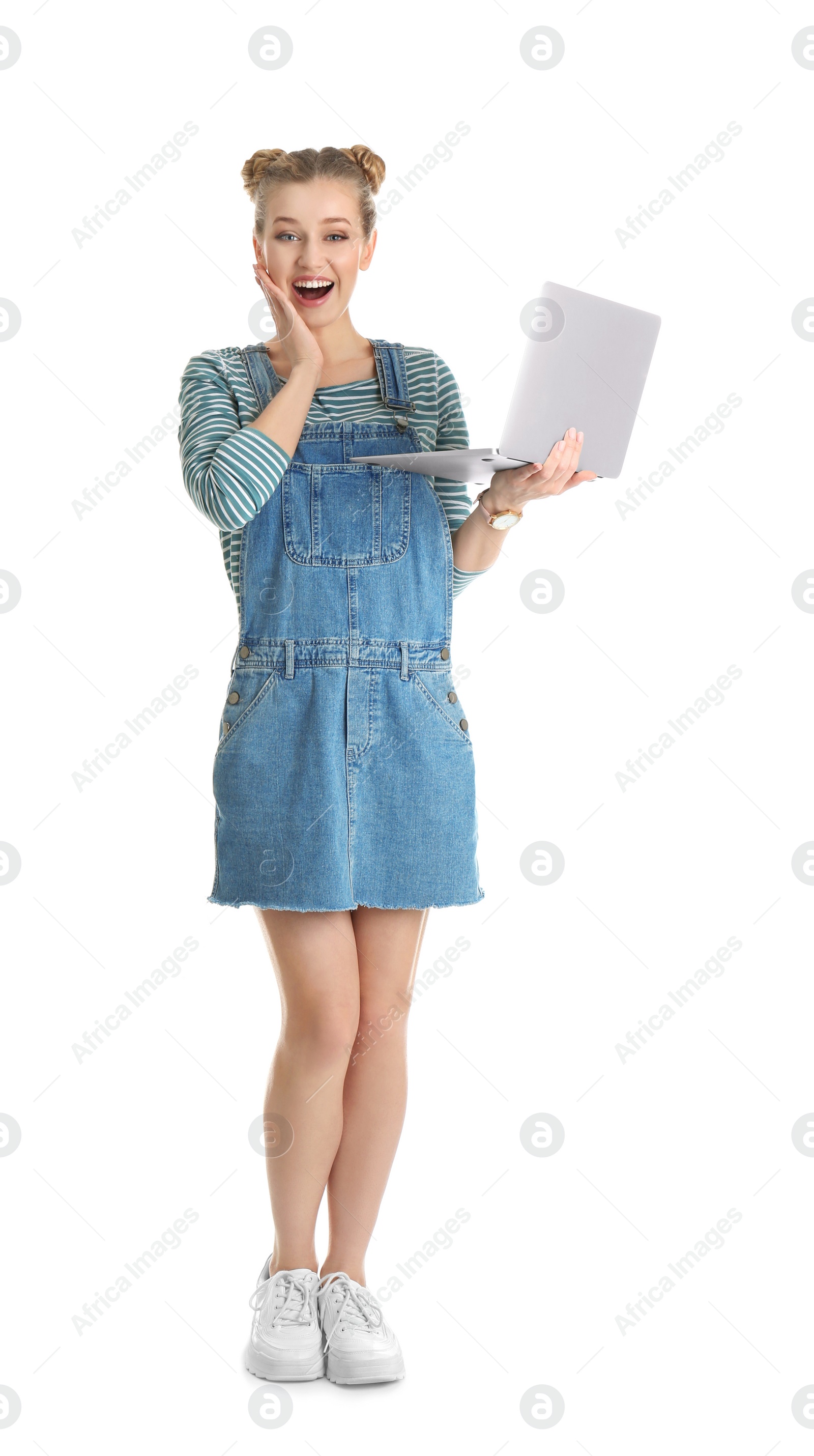 Photo of Full length portrait of emotional young woman with laptop isolated on white