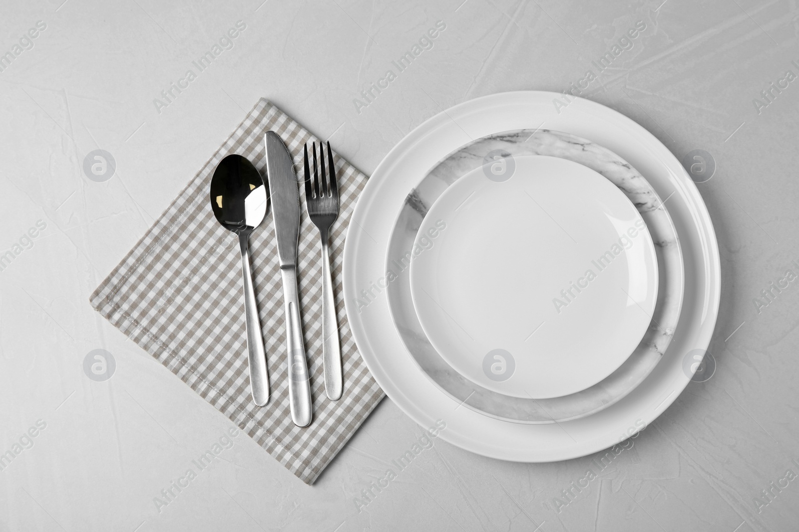 Photo of Beautiful table setting on grey background, flat lay