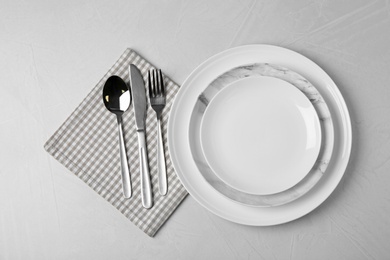 Photo of Beautiful table setting on grey background, flat lay