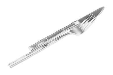 Fork and knife isolated on white. Stylish shiny cutlery set