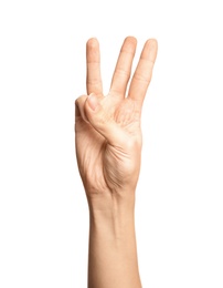 Photo of Woman showing number six on white background, closeup. Sign language