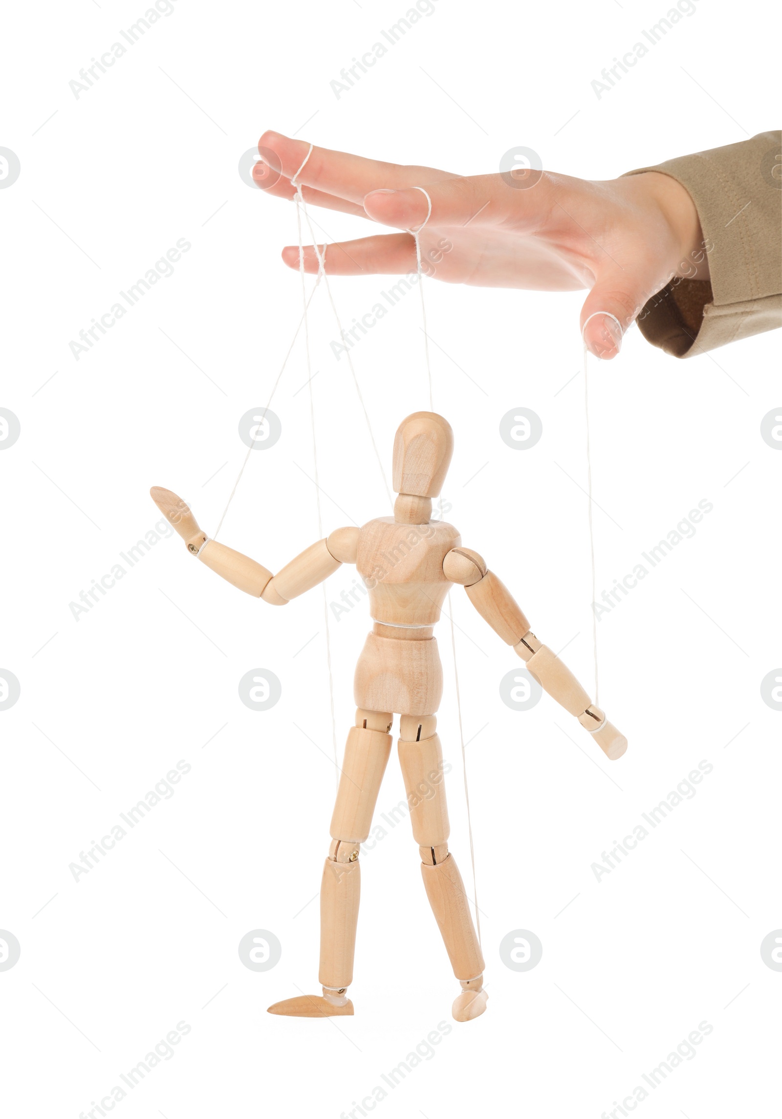 Photo of Woman pulling strings of puppet on white background, closeup