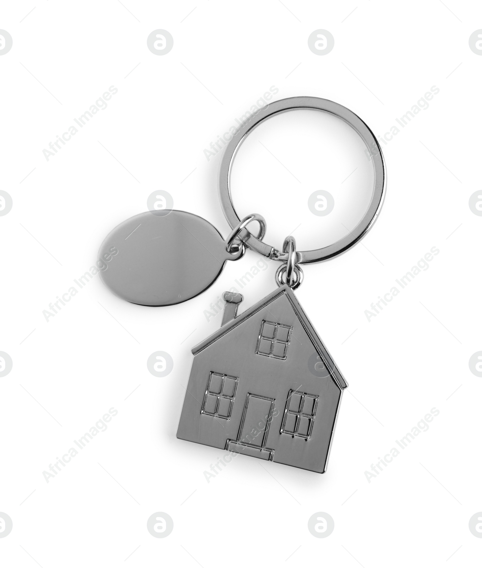 Photo of Metallic keychains with key ring isolated on white, top view