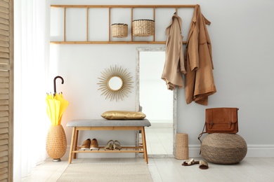 Cozy hallway interior with new stylish furniture