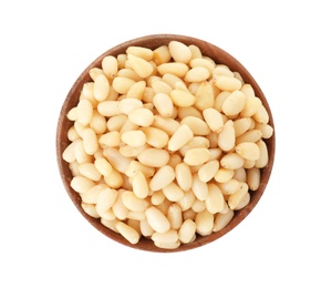 Bowl with pine nuts on white background, top view