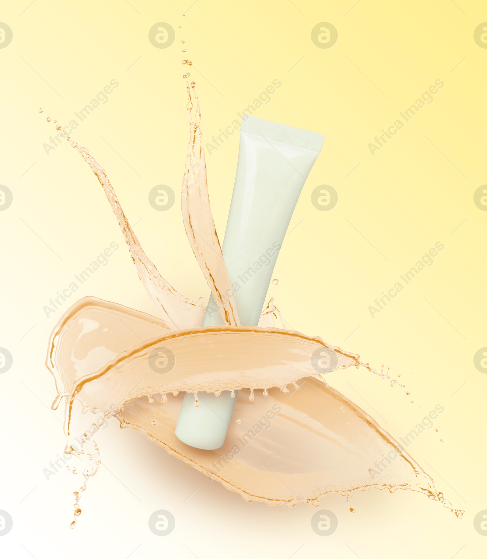 Image of Splashes of cosmetic product and tube with space for design on yellow gradient background
