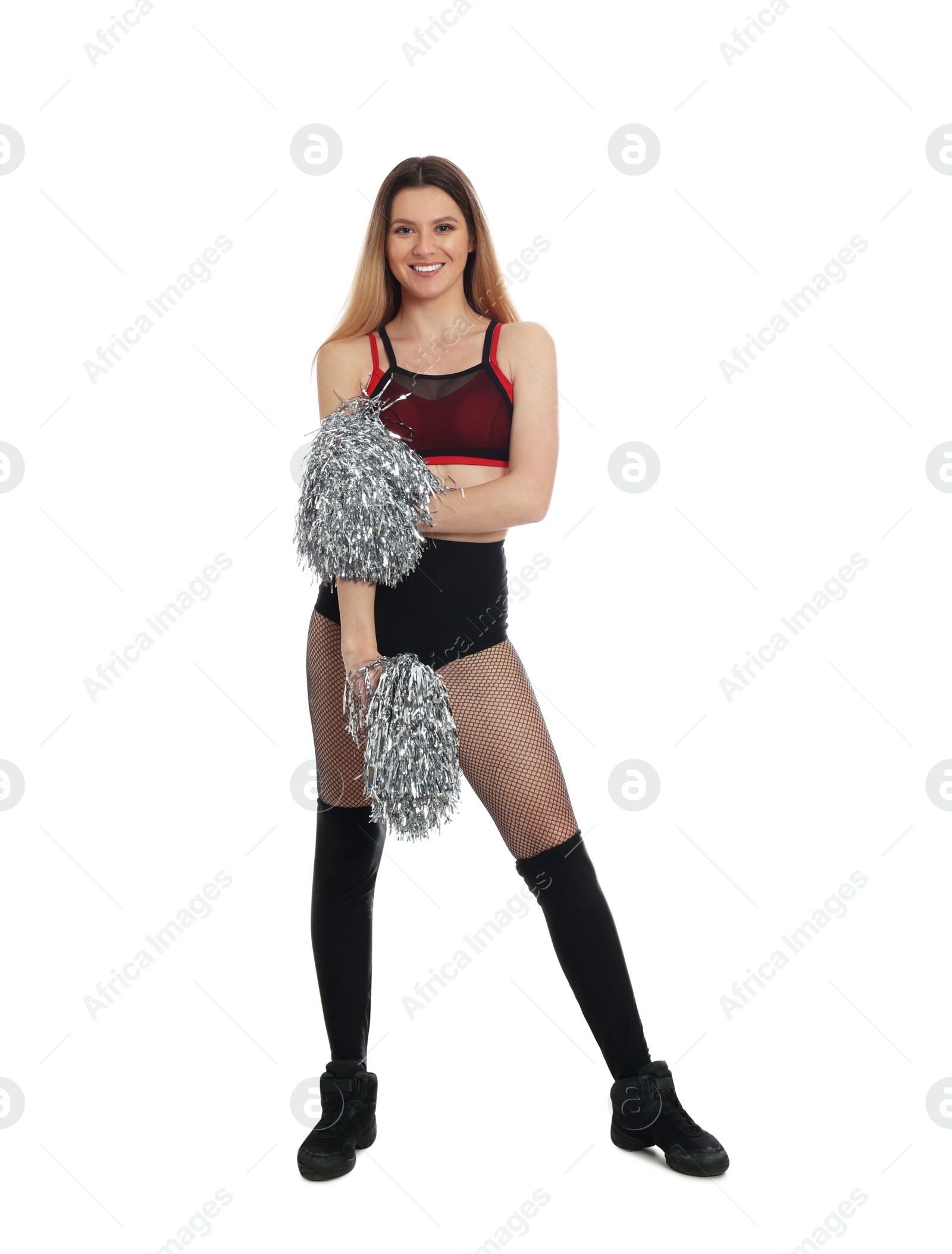 Photo of Beautiful cheerleader in costume holding pom poms on white background