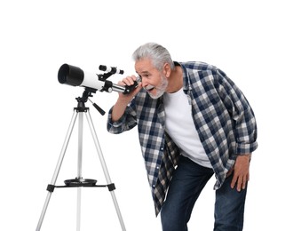 Photo of Senior astronomer looking at stars through telescope on white background