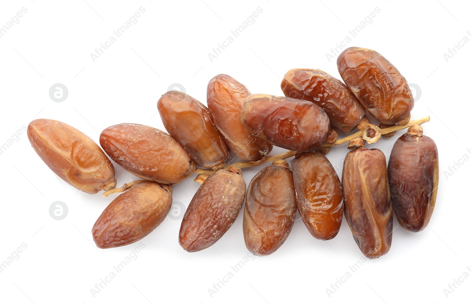 Photo of Sweet dates on branch against white background, top view. Dried fruit as healthy snack