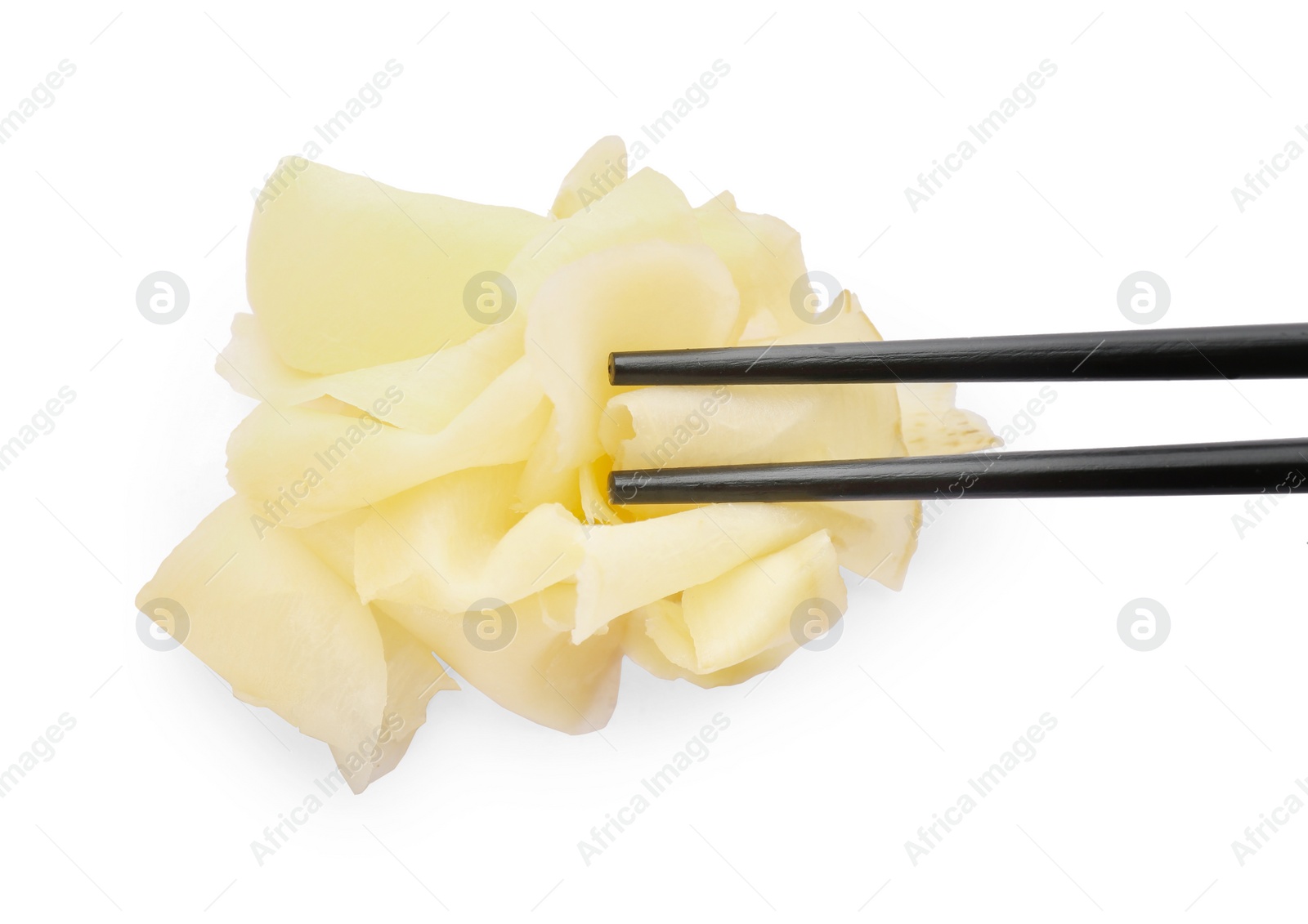 Photo of Chopsticks with pickled ginger on white background, top view