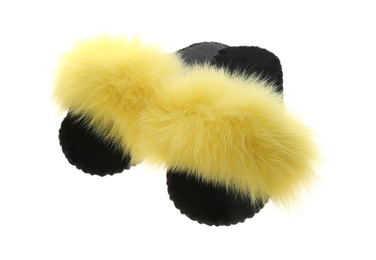 Photo of Pair of soft open toe slippers with yellow fur on white background