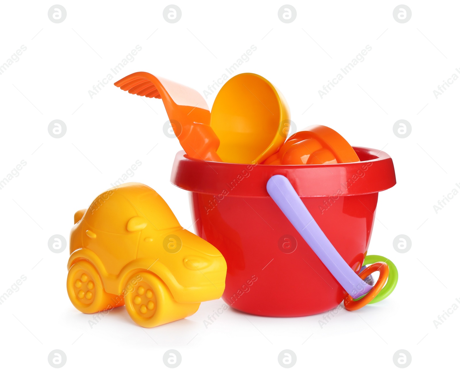 Photo of Set of plastic beach toys on white background