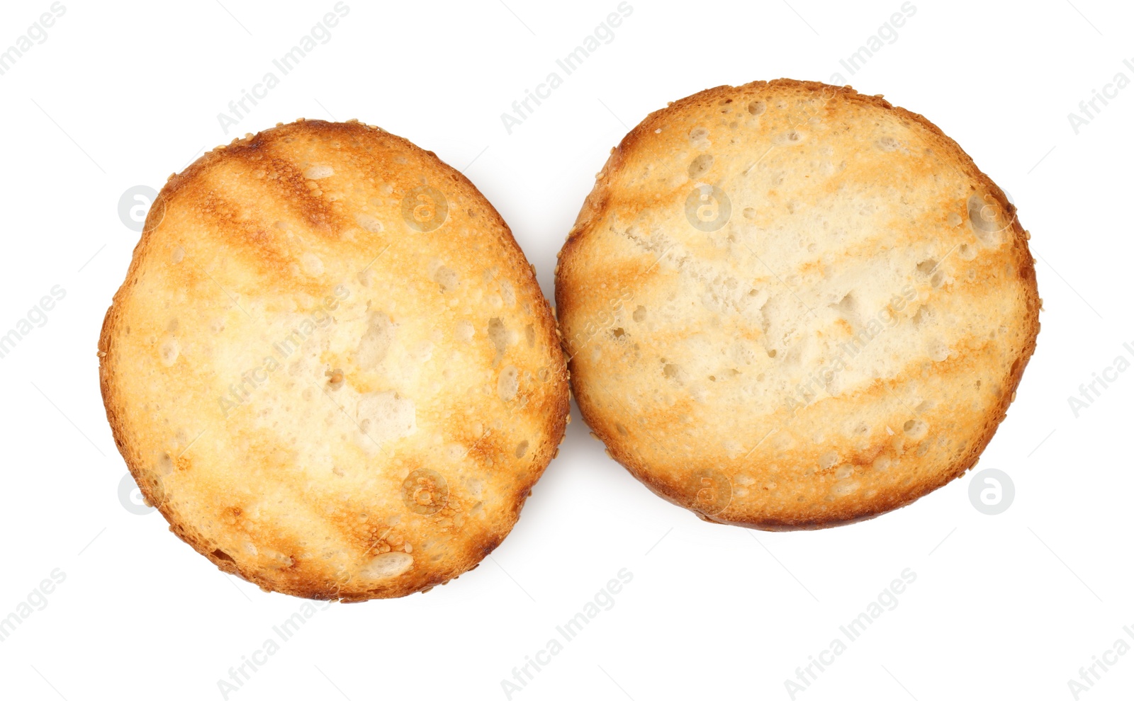 Photo of Halves of grilled burger bun isolated on white, top view