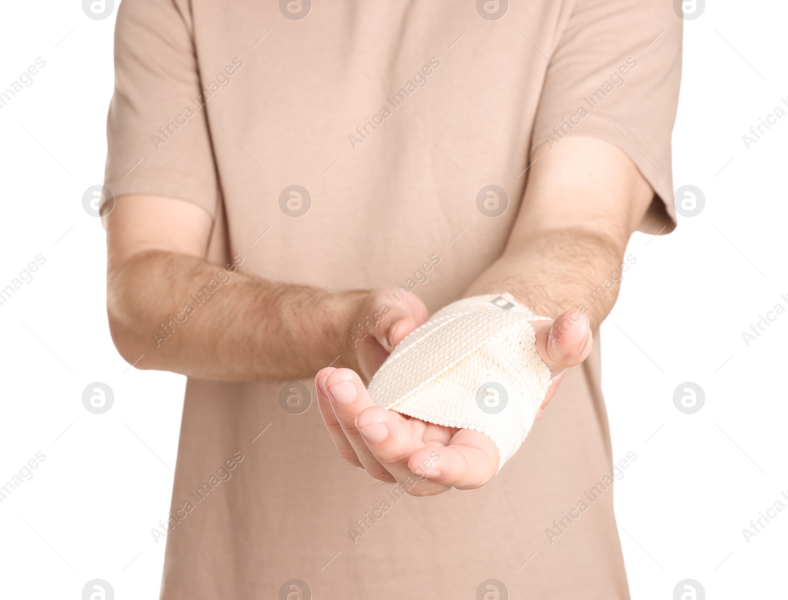 Photo of Man with hand wrapped in medical bandage on white background, closeup