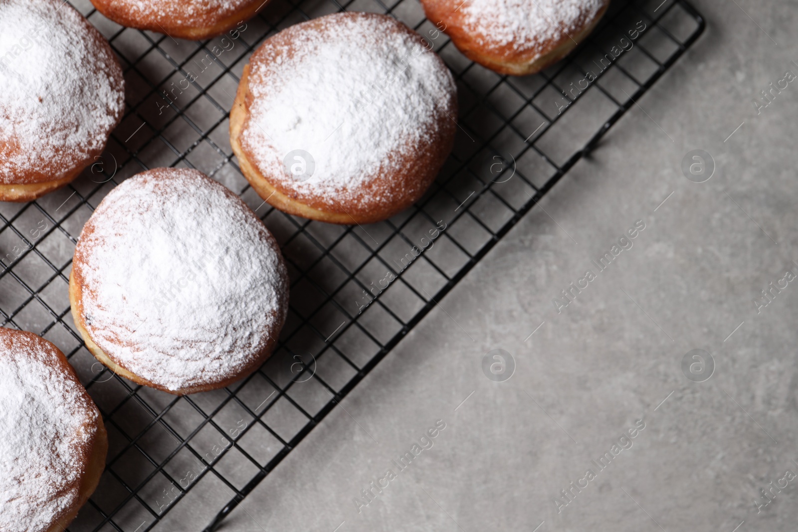 Photo of Delicious sweet buns on table, top view. Space for text