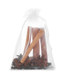 Photo of Scented sachet with cinnamon and anise isolated on white