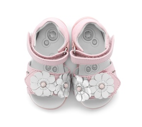 Photo of Pair of cute baby sandals decorated with flowers on white background, top view