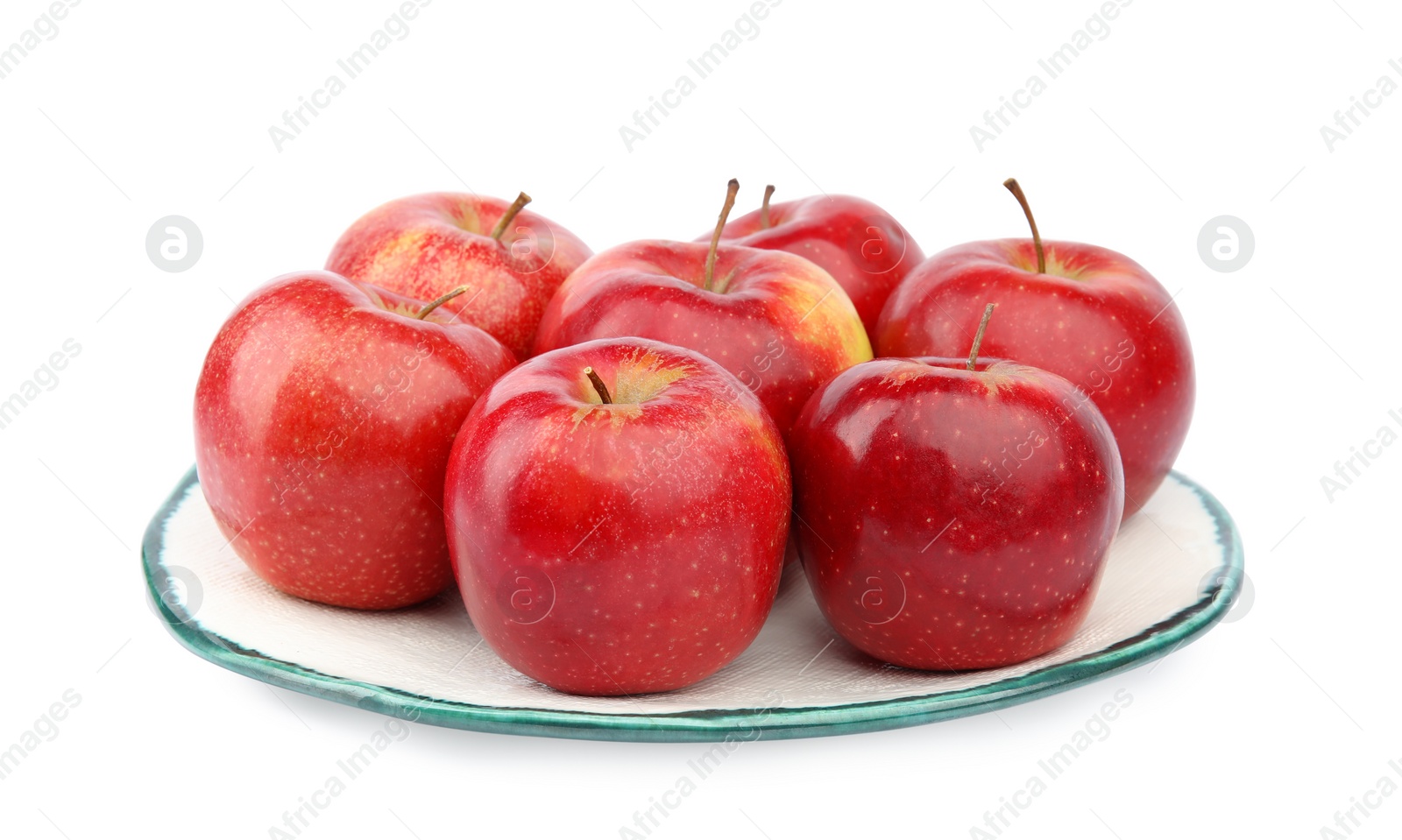 Photo of Plate of ripe juicy red apples on white background