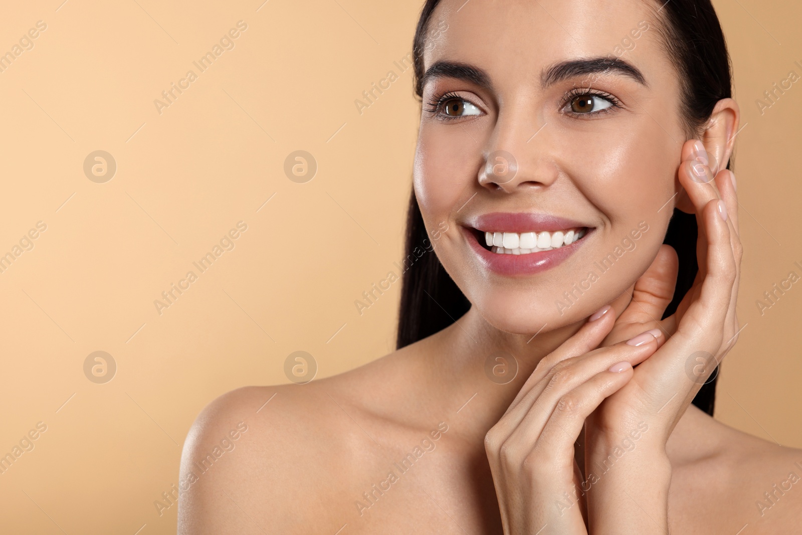 Photo of Portrait of attractive young woman on beige background, space for text. Spa treatment