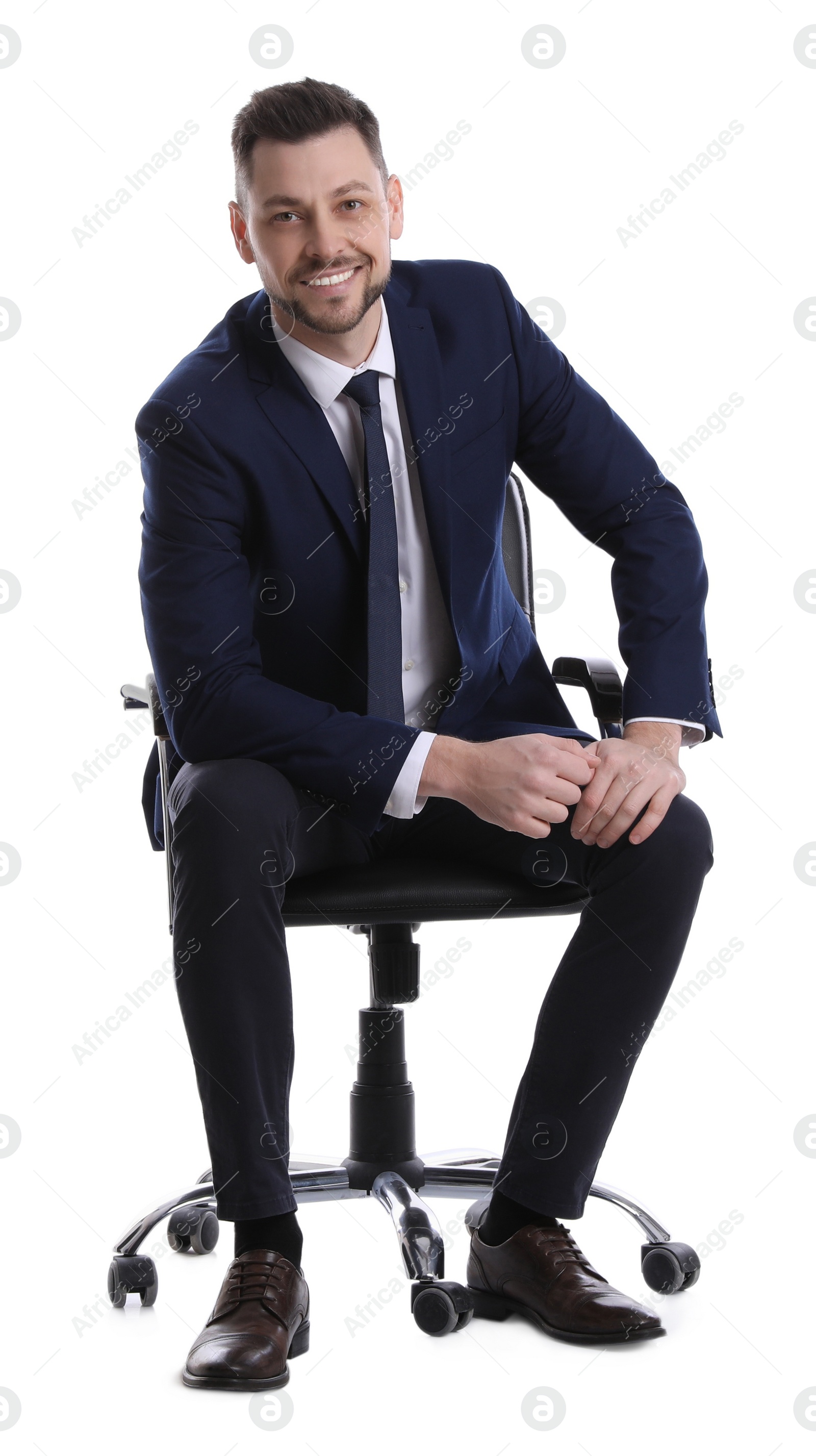 Photo of Handsome businessman sitting in office chair on white background